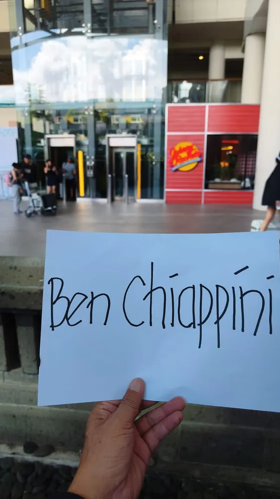 Name-board airport pickup — a friendly meet-and-greet at Bali's Ngurah Rai airport